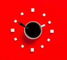 coffee cup against red background
